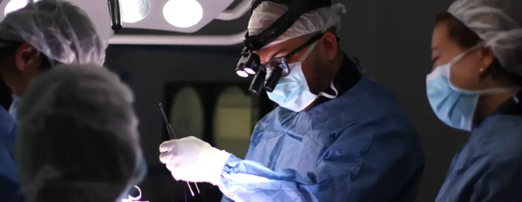 Dr. Juan Carlos Pérez reviewing spinal imaging for an international patient — SpineAx